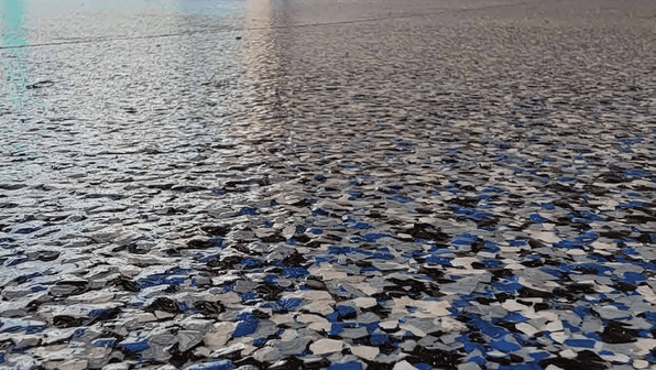 epoxy garage floor with metallic blue finish