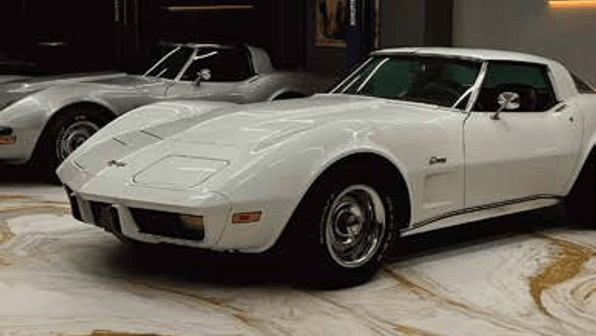 metallic epoxy flooring with swirling gold finish